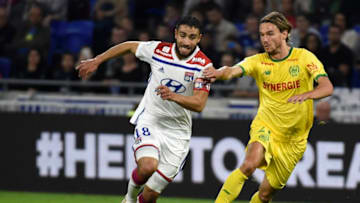 Lyon's French midfielder Nabil Fekir (L) vies with Nantes' Slovenian midfielder Rene Krhin (R) during the French L1 football match Lyon (OL) vs Nantes (FCN), on September 29, 2018 in Décines-Charpieu near Lyon, southeastern France. (Photo by JEAN-PHILIPPE KSIAZEK / AFP) (Photo credit should read JEAN-PHILIPPE KSIAZEK/AFP/Getty Images)