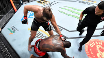 LAS VEGAS, NEVADA - JUNE 26: (L-R) Tanner Boser of Canada punches Ovince Saint Preux in a heavyweight fight during the UFC Fight Night event at UFC APEX on June 26, 2021 in Las Vegas, Nevada. (Photo by Chris Unger/Zuffa LLC)