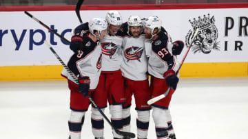 Feb 12, 2022; Montreal, Quebec, CAN; Columbus Blue left wing Patrik Laine (29) celebrates his goal against Montreal Canadiens with teammates during the third period at Bell Centre. Mandatory Credit: Jean-Yves Ahern-USA TODAY Sports