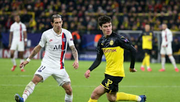 DORTMUND, GERMANY - FEBRUARY 18: Giovanni Reyna of Borussia Dortmund, Angel Di Maria of PSG (left) during the UEFA Champions League round of 16 first leg match between Borussia Dortmund and Paris Saint-Germain (PSG) at Signal Iduna Park on February 18, 2020 in Dortmund, Germany. (Photo by Jean Catuffe/Getty Images)