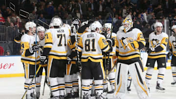 NEW YORK, NY - OCTOBER 17: Members of the Pittsburgh Penguins celebrate after defeating the New York Rangers 5-4 in overtime at Madison Square Garden on October 17, 2017 in New York City. (Photo by Jared Silber/NHLI via Getty Images)