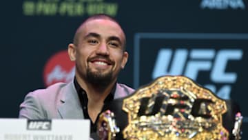 MELBOURNE, AUSTRALIA - FEBRUARY 8: UFC middleweight champion Robert Whittaker of Australia speaks to the media during the UFC 234 Press Conference inside The Palms at Crown on February 8, 2019 in Melbourne, Australia. (Photo by Jeff Bottari/Zuffa LLC/Zuffa LLC via Getty Images)