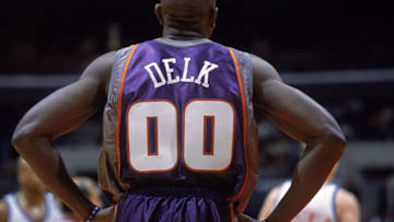 25 Nov 2000: A rear view of Tony Delk #00 of the Phoenix Suns watching the action during the game against the Los Angeles Clippers at the STAPLES Center in Los Angeles, California. The Suns defeated the Clippers 95-89. NOTE TO USER: It is expressly understood that the only rights Allsport are offering to license in this Photograph are one-time, non-exclusive editorial rights. No advertising or commercial uses of any kind may be made of Allsport photos. User acknowledges that it is aware that Allsport is an editorial sports agency and that NO RELEASES OF ANY TYPE ARE OBTAINED from the subjects contained in the photographs.Mandatory Credit: Robert Laberge /Allsport