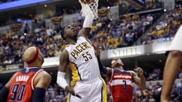 May 7, 2014; Indianapolis, IN, USA; Indiana Pacers center Roy Hibbert (55) dunks against Washington Wizards forward Drew Gooden (90) in game two of the second round of the 2014 NBA Playoffs at Bankers Life Fieldhouse. Indiana defeats Washington 86-82. Mandatory Credit: Brian Spurlock-USA TODAY Sports