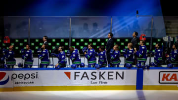 EDMONTON, ALBERTA - SEPTEMBER 03: The Vancouver Canucks stand for the national anthem prior to Game Six of the Western Conference Second Round against the Vegas Golden Knights during the 2020 NHL Stanley Cup Playoffs at Rogers Place on September 03, 2020 in Edmonton, Alberta, Canada. (Photo by Bruce Bennett/Getty Images)