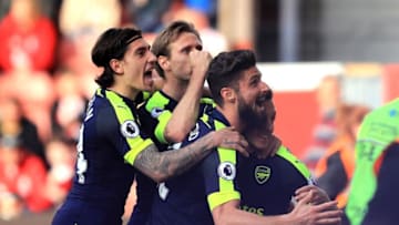 STOKE ON TRENT, ENGLAND - MAY 13: Mesut Ozil of Arsenal celebrates scoring his sides second goal with his Arsenal team mates during the Premier League match between Stoke City and Arsenal at Bet365 Stadium on May 13, 2017 in Stoke on Trent, England. (Photo by Richard Heathcote/Getty Images)