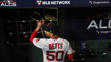 HOUSTON, TX - OCTOBER 17: Mookie Betts #50 of the Boston Red Sox heads to the clubhouse after Red Sox defeated the Houston Astros in Game 4 of the ALCS at Minute Maid Park on Wednesday, October 17, 2018 in Houston, Texas. (Photo by Loren Elliott/MLB Photos via Getty Images)