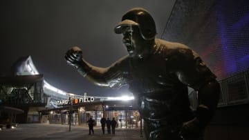 A statue of former Minnesota Twins legend Kirby Puckett has ice and snow on it as Target Field behind undergoes preparations for the NHL Winter Classic on January 1.(Bruce Kluckhohn-USA TODAY Sports)