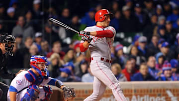 Apr 11, 2016; Chicago, IL, USA; Cincinnati Reds first baseman Joey Votto (19) hits a single during the eighth inning against the Chicago Cubs at Wrigley Field. Chicago won 5-3. Mandatory Credit: Dennis Wierzbicki-USA TODAY Sports