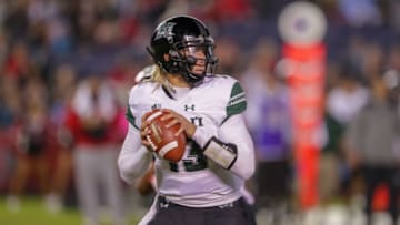 SAN DIEGO, CA - NOVEMBER 24: Cole McDonald #13 of the Hawaii Rainbow Warriors looks to throw the ball in the first half against the San Diego State Aztecs at SDCCU Stadium on November 24, 2018 in San Diego, California. (Photo by Kent Horner/Getty Images)