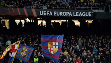 Barcelona's supporters wave flags during the UEFA Europa League round of 32 first-leg football match between FC Barcelona and Manchester United at the Camp Nou stadium in Barcelona, on February 16, 2023. (Photo by Pau BARRENA / AFP) (Photo by PAU BARRENA/AFP via Getty Images)