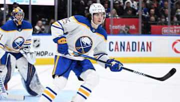 Apr 12, 2022; Toronto, Ontario, CAN; Buffalo Sabres defenseman Owen Power (25) pursues the play against the Toronto Maple Leafs in the first period at Scotiabank Arena. Mandatory Credit: Dan Hamilton-USA TODAY Sports