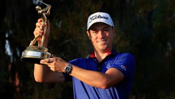 PONTE VEDRA BEACH, FLORIDA - MARCH 14: Justin Thomas of the United States celebrates with the trophy after winning during the final round of THE PLAYERS Championship on THE PLAYERS Stadium Course at TPC Sawgrass on March 14, 2021 in Ponte Vedra Beach, Florida. (Photo by Sam Greenwood/Getty Images)