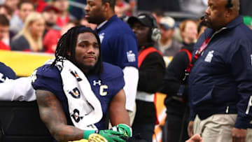 Jan 1, 2016; Glendale, AZ, USA; Notre Dame Fighting Irish linebacker Jaylon Smith (9) cries as he is carted off the field after suffering an injury un the first quarter against the Ohio State Buckeyes during the 2016 Fiesta Bowl at University of Phoenix Stadium. Mandatory Credit: Mark J. Rebilas-USA TODAY Sports