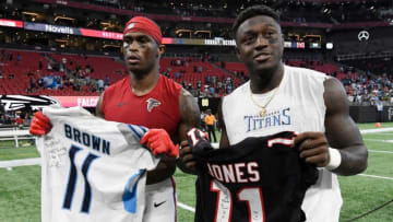 Atlanta Falcons wide receiver Julio Jones (11) and Tennessee Titans wide receiver A.J. Brown (11) exchange jerseys after the Titans' 24-10 win at Mercedes-Benz Stadium Sunday, Sept. 29, 2019 in Atlanta, Ga.8508829