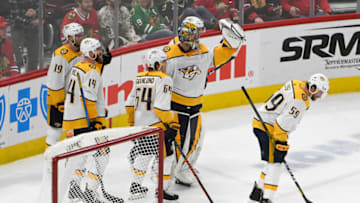 Jan 9, 2020; Chicago, Illinois, USA; Nashville Predators goaltender Pekka Rinne (35) celebrates after scoring a empty net goal against the Chicago Blackhawks with his teammates during the third period at United Center. Mandatory Credit: David Banks-USA TODAY Sports