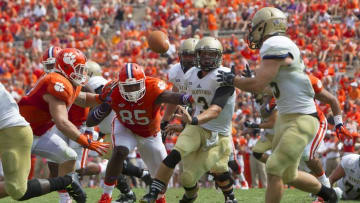 Sep 5, 2015; Clemson, SC, USA; Wofford Terriers quarterback Evan Jacks (3) passes the ball as Clemson Tigers defensive end Dane Rogers (85) defends during the second half at Clemson Memorial Stadium. Mandatory Credit: Joshua S. Kelly-USA TODAY Sports
