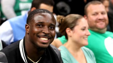 BOSTON, MA - OCTOBER 30: Sony Michel of the New England Patriots sits on the baseline of the game between the Boston Celtics and the Detroit Pistons at TD Garden on October 30, 2018 in Boston, Massachusetts. (Photo by Maddie Meyer/Getty Images)