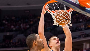 DENVER, CO - OCTOBER 20: Nikola Jokic #15 of the Denver Nuggets dunks the ball during the second half against the Phoenix Suns at Pepsi Center on October 20, 2018 in Denver, Colorado. NOTE TO USER: User expressly acknowledges and agrees that, by downloading and or using this photograph, User is consenting to the terms and conditions of the Getty Images License Agreement. (Photo by Timothy Nwachukwu/Getty Images)