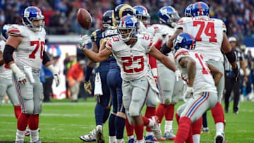 Oct 23, 2016; London, ENG; Running back Rashad Jennings (23) of the New York Giants celebrates his 4th quarter winning touchdown during the game between the Los Angeles Rams and the New York Giants at Twickenham Stadium. Mandatory Credit: Steve Flynn-USA TODAY Sports