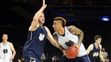 Mar 17, 2016; Brooklyn, NY, USA; Notre Dame Fighting Irish forward Zach Auguste (right) drives to the basket during a practice day before the first round of the NCAA men