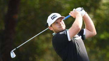 DUBAI, UNITED ARAB EMIRATES - DECEMBER 12: Tyrrell Hatton of England tees off on the 4th hole during Day 3 of the DP World Tour Championship at Jumeirah Golf Estates on December 12, 2020 in Dubai, United Arab Emirates. (Photo by Ross Kinnaird/Getty Images)