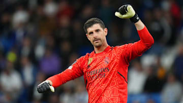 MADRID, SPAIN - APRIL 12: Thibaut Courtois of Real Madrid celebrates after their side's victory during the UEFA Champions League quarterfinal first leg match between Real Madrid and Chelsea FC at Estadio Santiago Bernabeu on April 12, 2023 in Madrid, Spain. (Photo by Angel Martinez/Getty Images)