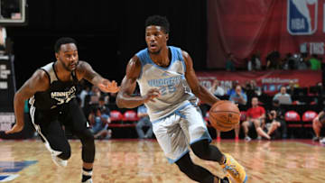 LAS VEGAS, NV - JULY 9: Malik Beasley #25 of the Denver Nuggets handles the ball against the Minnesota Timberwolves during the 2017 Las Vegas Summer League on July 9, 2017 at the Thomas & Mack Center in Las Vegas, Nevada. NOTE TO USER: User expressly acknowledges and agrees that, by downloading and/or using this Photograph, user is consenting to the terms and conditions of the Getty Images License Agreement. Mandatory Copyright Notice: Copyright 2017 NBAE (Photo by Garrett Ellwood/NBAE via Getty Images)