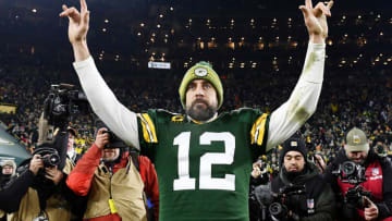 GREEN BAY, WISCONSIN - JANUARY 12: Aaron Rodgers #12 of the Green Bay Packers celebrates after defeating the Seattle Seahawks 28-23 in the NFC Divisional Playoff game at Lambeau Field on January 12, 2020 in Green Bay, Wisconsin. (Photo by Stacy Revere/Getty Images)