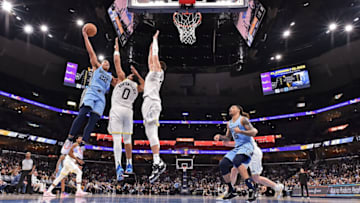 MEMPHIS, TENNESSEE - FEBRUARY 15: Desmond Bane #22 of the Memphis Grizzlies shoots over Talen Horton-Tucker #0 of the Utah Jazz during the game at FedExForum on February 15, 2023 in Memphis, Tennessee. NOTE TO USER: User expressly acknowledges and agrees that, by downloading and or using this photograph, User is consenting to the terms and conditions of the Getty Images License Agreement. (Photo by Justin Ford/Getty Images)