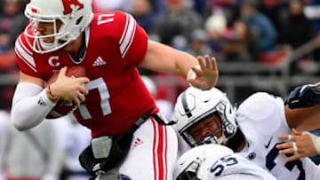 PISCATAWAY, NJ - NOVEMBER 17: (L-R) Giovanni Rescigno #17 of the Rutgers Scarlet Knights is wrapped up by Antonio Shelton #55 of the Penn State Nittany Lions and PJ Mustipher #93 during the fourth quarter at HighPoint.com Stadium on November 17, 2018 in Piscataway, New Jersey. Penn State won 20-7. (Photo by Corey Perrine/Getty Images)