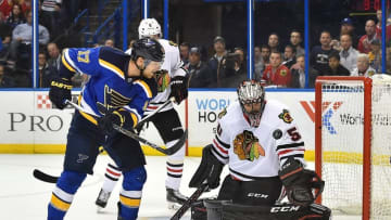 Apr 25, 2016; St. Louis, MO, USA; Chicago Blackhawks goalie Corey Crawford (50) blocks the shot behind St. Louis Blues left wing Jaden Schwartz (17) during the second period in game seven of the first round of the 2016 Stanley Cup Playoffs at Scottrade Center. Mandatory Credit: Jasen Vinlove-USA TODAY Sports