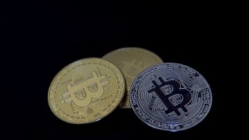 ANKARA, TURKEY - JANUARY 2: A picture shows Cryptocurrency, Bitcoins in Ankara, Turkey on January 2, 2018. (Photo by Gokhan Balci/Anadolu Agency/Getty Images)