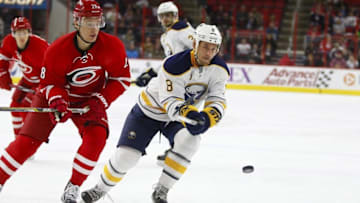 Jan 8, 2015; Raleigh, NC, USA; Buffalo Sabres forward Cody McCormick (8) skates against the Carolina Hurricanes at PNC Arena. The Hurricanes defeated the Sabres 5-2. Mandatory Credit: James Guillory-USA TODAY Sports