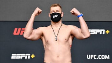 LAS VEGAS, NEVADA - FEBRUARY 05: In this handout image provided by the UFC, Alexander Volkov of Russia poses on the scale during the UFC weigh-in at UFC APEX on February 05, 2021 in Las Vegas, Nevada. (Photo by Chris Unger/Zuffa LLC via Getty Images)
