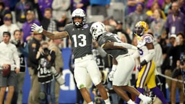 GLENDALE, ARIZONA - JANUARY 01: Wide receiver Gabriel Davis #13 reacts with teammate wide receiver Dredrick Snelson #5 of the UCF Knights after scoring a 32-yard touchdown during the second quarter of the PlayStation Fiesta Bowl between LSU and Central Florida at State Farm Stadium on January 01, 2019 in Glendale, Arizona. (Photo by Christian Petersen/Getty Images)