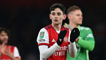 Arsenal's English midfielder Charlie Patino, who scored a goal on his debut, applauds supporters on the pitch after the English League Cup quarter-final football match between Arsenal and Sunderland at the Emirates Stadium in London on December 21, 2021. - Arsenal won the game 5-1. - RESTRICTED TO EDITORIAL USE. No use with unauthorized audio, video, data, fixture lists, club/league logos or 'live' services. Online in-match use limited to 120 images. An additional 40 images may be used in extra time. No video emulation. Social media in-match use limited to 120 images. An additional 40 images may be used in extra time. No use in betting publications, games or single club/league/player publications. (Photo by Glyn KIRK / AFP) / RESTRICTED TO EDITORIAL USE. No use with unauthorized audio, video, data, fixture lists, club/league logos or 'live' services. Online in-match use limited to 120 images. An additional 40 images may be used in extra time. No video emulation. Social media in-match use limited to 120 images. An additional 40 images may be used in extra time. No use in betting publications, games or single club/league/player publications. / RESTRICTED TO EDITORIAL USE. No use with unauthorized audio, video, data, fixture lists, club/league logos or 'live' services. Online in-match use limited to 120 images. An additional 40 images may be used in extra time. No video emulation. Social media in-match use limited to 120 images. An additional 40 images may be used in extra time. No use in betting publications, games or single club/league/player publications. (Photo by GLYN KIRK/AFP via Getty Images)