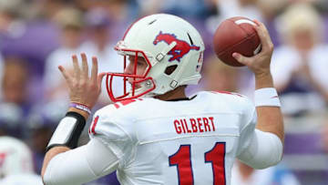 FORT WORTH, TX - SEPTEMBER 28: Garrett Gilbert #11 of the Southern Methodist Mustangs throws against the TCU Horned Frogs at Amon G. Carter Stadium on September 28, 2013 in Fort Worth, Texas. (Photo by Ronald Martinez/Getty Images)
