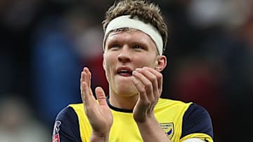 NEWCASTLE UPON TYNE, ENGLAND - JANUARY 25: Rob Dickie of Oxford United applauds his fans during the FA Cup Fourth Round match between Newcastle United and Oxford United at St. James Park on January 25, 2020 in Newcastle upon Tyne, England. (Photo by Ian MacNicol/Getty Images)