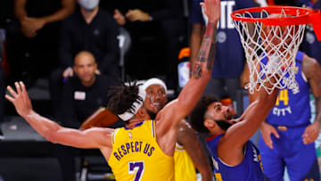 LAKE BUENA VISTA, FLORIDA - SEPTEMBER 18: Jamal Murray #27 of the Denver Nuggets goes up for a shot against JaVale McGee #7 of the Los Angeles Lakers in Game One of the Western Conference Finals during the 2020 NBA Playoffs at AdventHealth Arena at the ESPN Wide World Of Sports Complex on September 18, 2020 in Lake Buena Vista, Florida. NOTE TO USER: User expressly acknowledges and agrees that, by downloading and or using this photograph, User is consenting to the terms and conditions of the Getty Images License Agreement. (Photo by Mike Ehrmann/Getty Images)