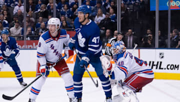 TORONTO, ON - DECEMBER 28: New York Rangers defenseman Jacob Trouba (8) battles with Toronto Maple Leafs left wing Pierre Engvall (47) in front of New York Rangers goaltender Alexandar Georgiev (40) during the third period in a game between the New York Rangers and the Toronto Maple Leafs on December 28, 2019, at Scotiabank Arena in Toronto, Ontario Canada. (Photo by Nick Turchiaro/Icon Sportswire via Getty Images)