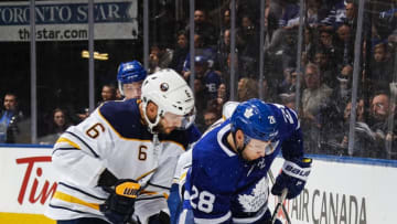 TORONTO, ON - MARCH 26: Connor Brown #28 of the Toronto Maple Leafs skates against Marco Scandella #6 of the Buffalo Sabres during the first period at the Air Canada Centre on March 26, 2018 in Toronto, Ontario, Canada. (Photo by Mark Blinch/NHLI via Getty Images)