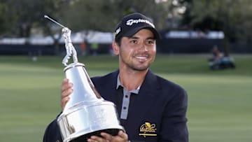 Mar 20, 2016; Orlando, FL, USA; Jason Day of Australia holds the champions trophy after winning the Arnold Palmer Invitational presented by Master Card at Bay Hill Club and Lodge . Mandatory Credit: Reinhold Matay-USA TODAY Sports
