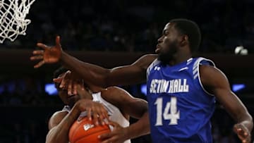 Mar 11, 2016; New York, NY, USA; Seton Hall Pirates guard Ismael Sanogo (14) defends against Xavier Musketeers forward Jalen Reynolds (1) during the first half of Big East conference tournament game at Madison Square Garden. 76-68 .Mandatory Credit: Noah K. Murray-USA TODAY Sports