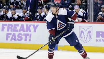 Nov 5, 2016; Denver, CO, USA; Colorado Avalanche defenseman Erik Johnson (6) controls the puck in the third period against the Minnesota Wild at the Pepsi Center. Mandatory Credit: Isaiah J. Downing-USA TODAY Sports