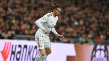 MADRID, SPAIN - DECEMBER 22: Gareth Bale of Real Madrid CF runs with the ball during the Liga match between Real Madrid CF and Athletic Club at Estadio Santiago Bernabeu on December 22, 2019 in Madrid, Spain. (Photo by Denis Doyle/Getty Images)