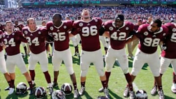 Nov 1, 2014; College Station, TX, USA; Texas A&M Aggies defensive lineman Jay Arnold (96) and teammates celebrate their victory over the Louisiana Monroe Warhawks at Kyle Field. Texas A&M Aggies won 21-16. Mandatory Credit: Ray Carlin-USA TODAY Sports