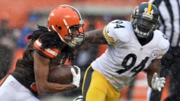 Jan 3, 2016; Cleveland, OH, USA; Cleveland Browns wide receiver Travis Benjamin (11) runs the ball as Pittsburgh Steelers inside linebacker Lawrence Timmons (94) pursues during the second quarter at FirstEnergy Stadium. Mandatory Credit: Ken Blaze-USA TODAY Sports