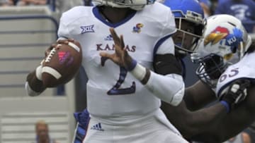 Sep 17, 2016; Memphis, TN, USA; Kansas Jayhawks quarterback Montell Cozart (2) stands in the pocket to pass during the first half against the Memphis Tigers at Liberty Bowl Memorial Stadium. Mandatory Credit: Justin Ford-USA TODAY Sports