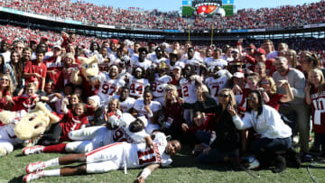 DALLAS, TEXAS - OCTOBER 12: The Oklahoma Sooners take a group photo after defeating the Texas Longhorns 34-27 during the 2019 AT&T Red River Showdown at Cotton Bowl on October 12, 2019 in Dallas, Texas. (Photo by Ronald Martinez/Getty Images)
